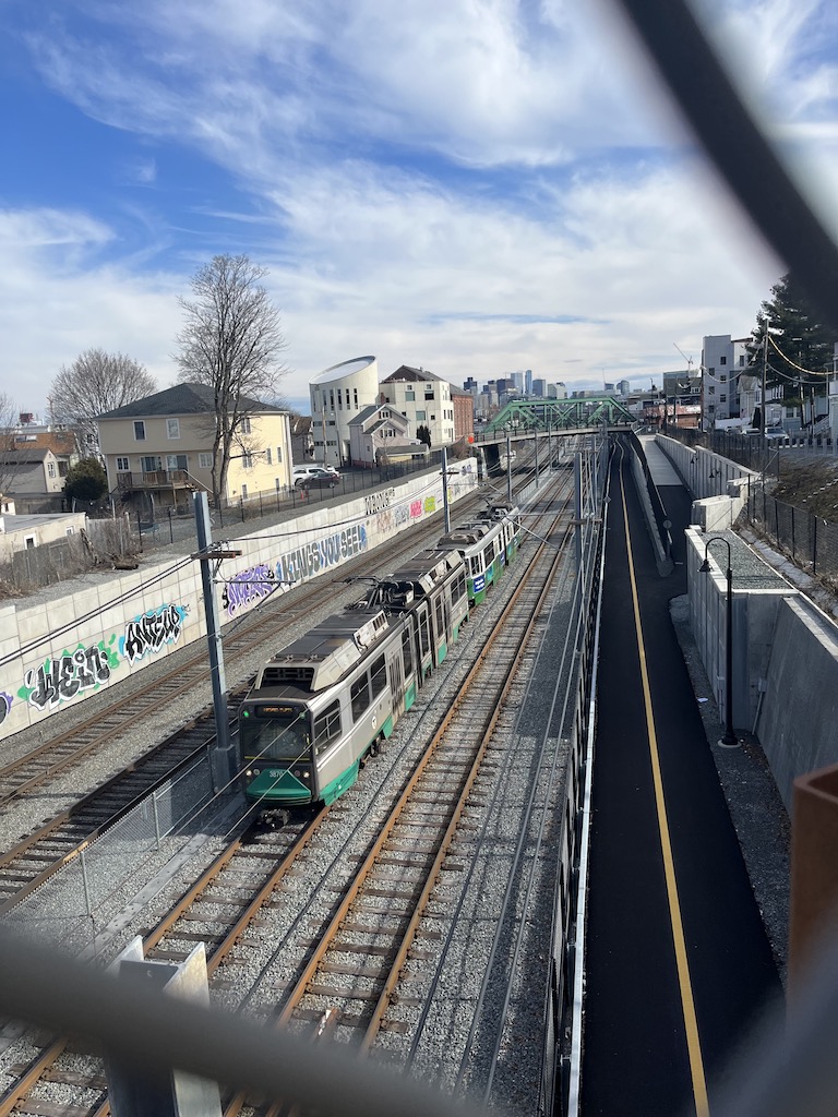 Green Line Train running through a neighborhood